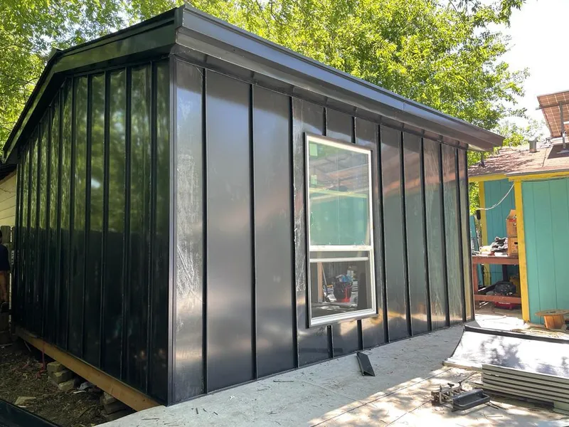 Black standing seam metal wall panels for Roof Inspection in Walker